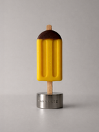 DAMNARTS Autumn Air scented ice pop candle on metal base, minimalist product shot